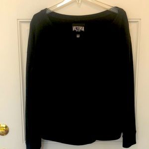Victoria Sport Black Light weight sweatshirt. Knitted at waist